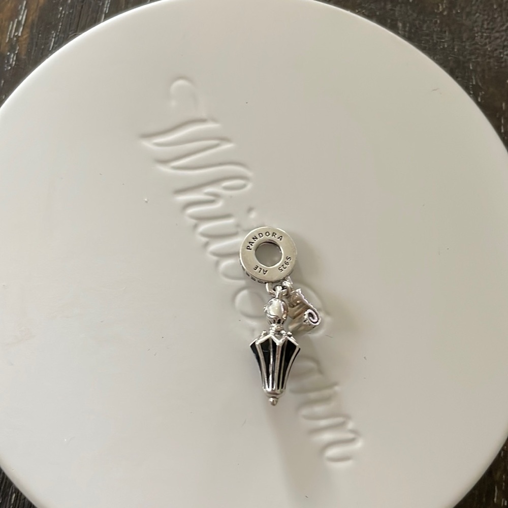 Disney silver with black enamel Mary  Poppins dangling umbrella Pandora charm.
